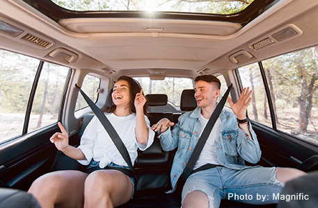 passengers in back seat buckle up.